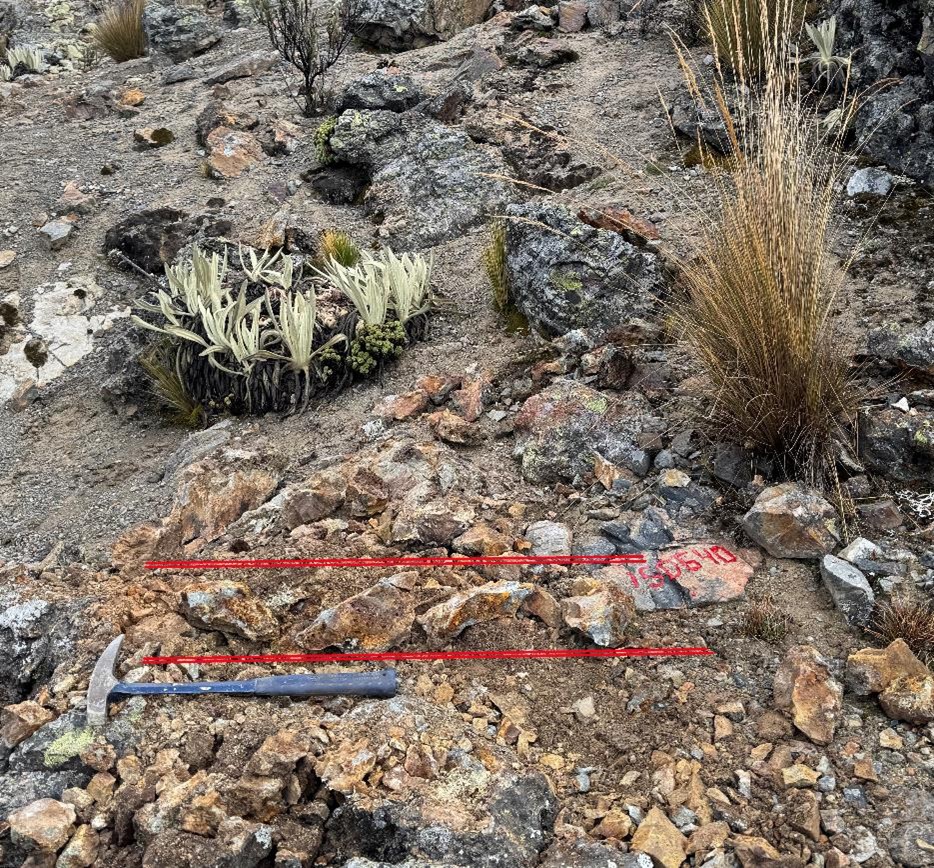 Sample 150640: 0.50m @ 3.71 g/t Au, 23.0 g/t Ag. Quartz-sulfide vein hosted in tension fracture through finely bedded quartz arenite. Sample trench filled and hand samples from vein placed across vein width.